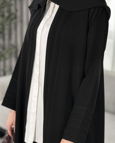 Picture of White shirt with black stitches